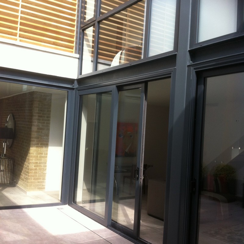 Anthracite aluminium sliding patio doors fitted in Kilburn