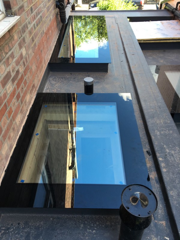 Multiple flat roof skylights on extension in Kilburn